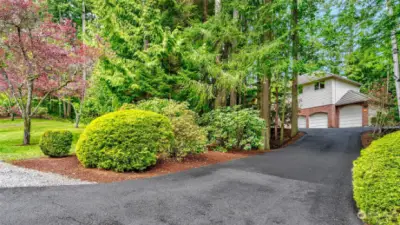 Enter your private oasis down the long driveway off the semi-private road. Surrounded by mature vegetation.