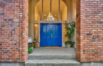 Enter through the double doors. Oversized entry windows let in lots of light!