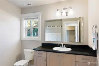 Full bathroom features a tub/shower and water view.