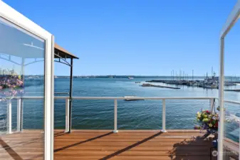 Enjoy passing ships & sailboat races from the main floor balcony!