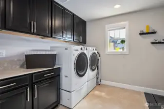 Convenient and Large upstairs laundry room