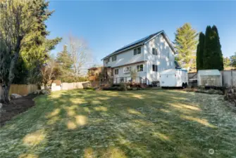 Check out the wonderful back yard of this home on over 1/3 acre fully fenced lot with western exposure.  Room for all your landscaping and gardening needs here