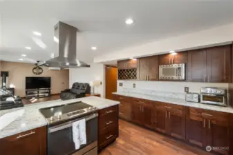 Another view of this amazing large new kitchen loaded with everything you need for cooking and entertaining.  Lots and lots of cabinets with new brushed nickle fixures and even built in wine rack