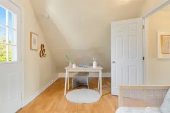 And another angle of the upper bedroom - door to private porch on left of photo