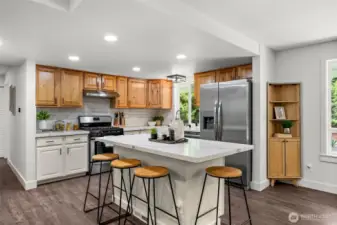The heart of the home shines in this light and bright kitchen, meticulously updated in 2024