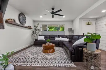 The living room features a ceiling fan to keep you comfortable during warmer months