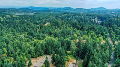 Aerial view of property and surrounding areas.
