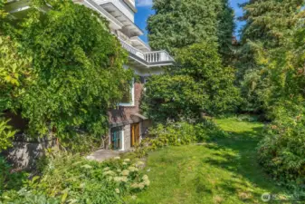 Amazing garden space surrounding the home. This shows the direct access to the ADU/Lower level living.