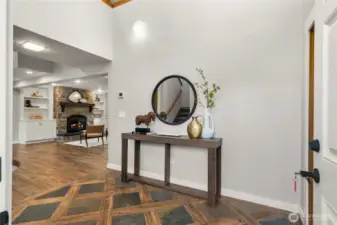 Visitors are welcomed with a 2-story entryway