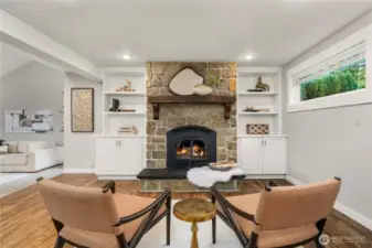 Cosy den/sitting area in front of the wood fireplace