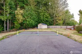 The athletic court is sized for pickle ball but can be used for other activities