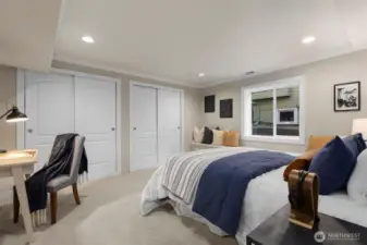 An inviting guest suite with a full bathroom provides comfort and privacy for visitors, extended family, or live-in support.