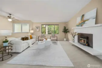 Spacious living area with a cozy fireplace