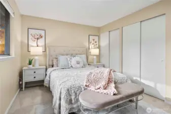 The main floor includes a primary suite with a private ¾ bath