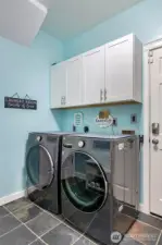 Utility room with huge closet.