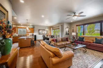 Home features wood flooring, air conditioning and wood window blinds throughout.