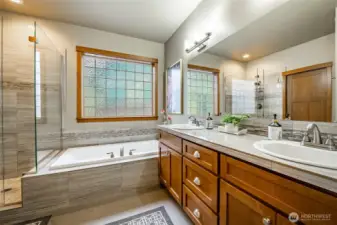 Spa-like primary bathroom to relax & unwind in your own soaking tub.
