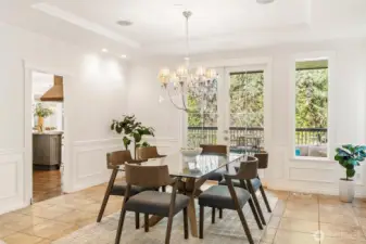 Large windows overlooking the covered deck with French doors, open for entertaining or dinner Alfresco!