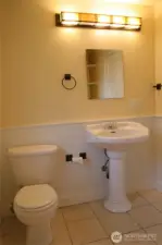 Full bathroom in the lower level unit.