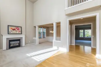 Entry and living room with soaring 2-story ceiling