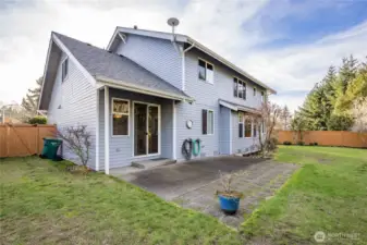 Large level lot with an extended back patio