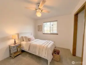 1st Bedroom is on the front side of the home. Virtually staged.