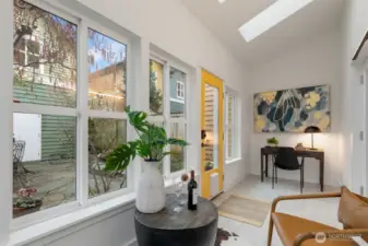 Sunroom with door to patio