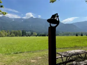 Dinner bell at the riverside picnic table