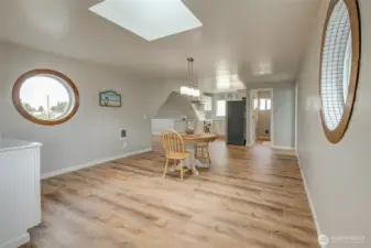 Love these porthole windows looking out the front and back of the property!