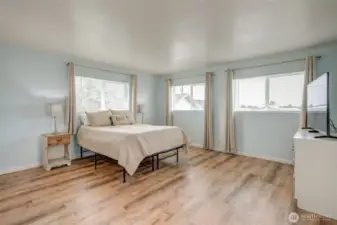 Spacious primary suite with lots of light