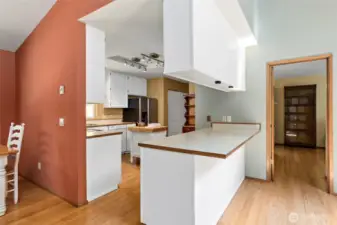 The lovely spacious kitchen with plenty of counter space and solid wood cabinets for ample storage.