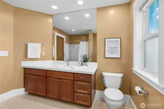 The main hallway bathroom upstairs with a tub and shower combo.