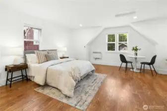 The roomy 460 sq ft Studio above the garage with a kitchenette and 3/4 bathroom.
