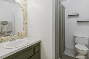 Well-lit full bath.
