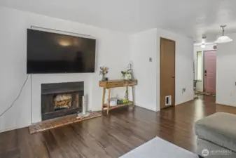 Unit A of the duplex offers a comfortable main floor living space with easy care flooring.
