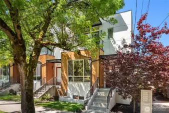 The far North Corner Townhome, beautiful entry, with the unique feature of three private balconies.
