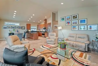 Open and welcoming living room, dining and Chef's Kitchen!