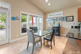 Peninsula seating- and dining table- OR enjoy your meals on the 35'x21' concrete patio!