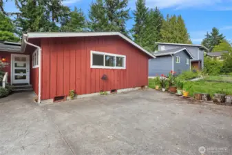 The parking pad, in addition to the attached garage and the lower off street parking on 102nd.