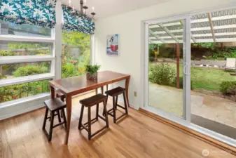 The dining space has windows looking out to your stunning side garden. So serene!