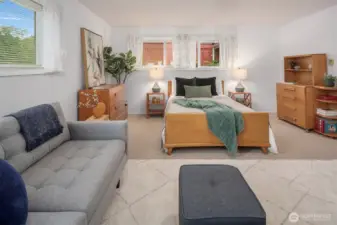 The primary bedroom is quite large; plenty of space to create your home oasis.