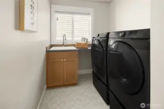 Laundry room has washer/dryer included.