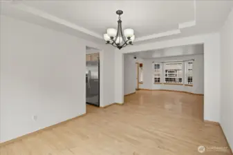 Another view of the dining room leading into the kitchen.