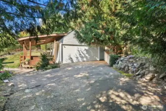 Detached two car garage with covered deck
