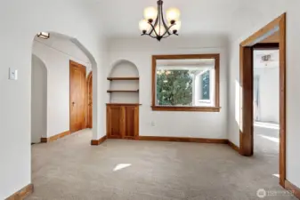 Formal dining with original built-ins and cove ceiling