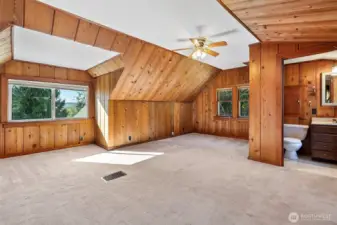 Upstairs bedroom with half bath