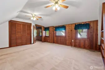 Second upstairs bedroom features a walk-in closet