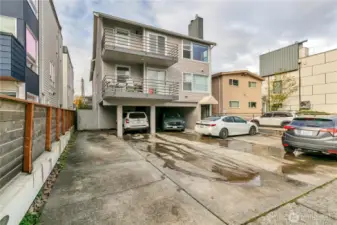 Parking space on the left next to the fence
