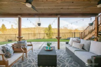 Covered patio off basement game room.