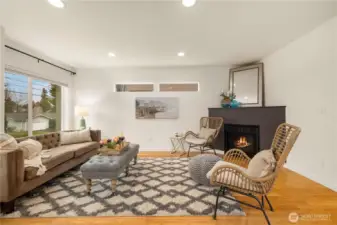 Cozy up to the fireplace on the main level. There is also a cable outlet above the fireplace if you want to add a TV there.